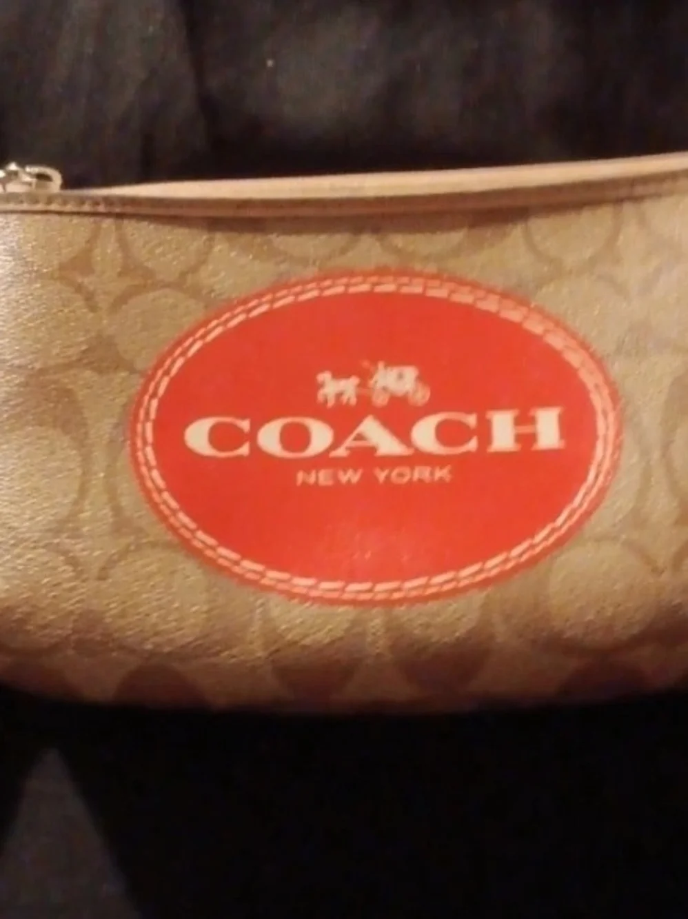 Coach Large Wristlet in Tan with Red Logo Patch